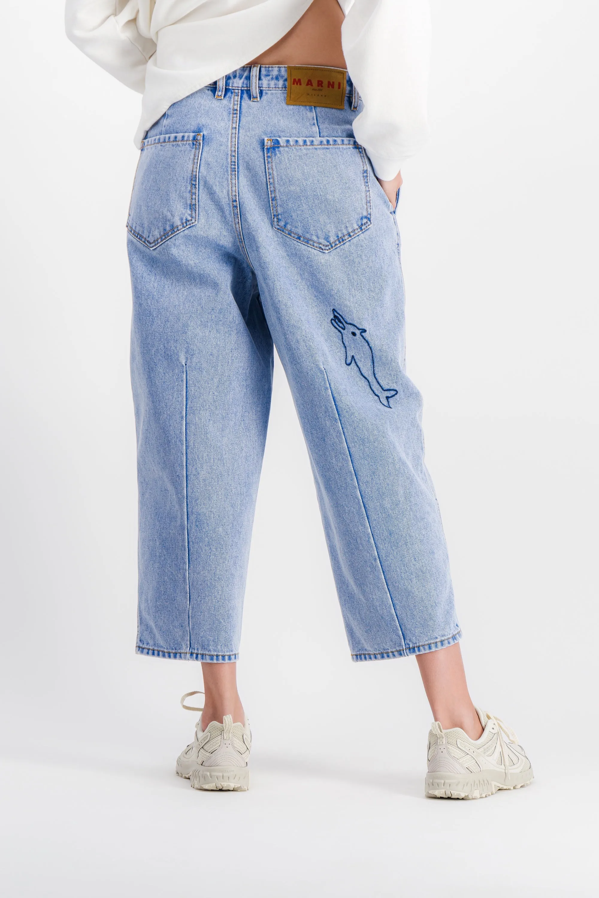 Wide-leg cropped light blue jeans with embroidered motifs